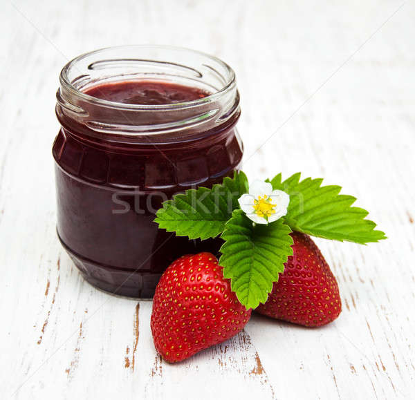Strawberry jam and fresh strawberries Stock photo © almaje