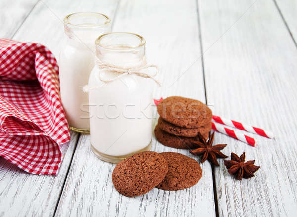 ストックフォト: オートミール · クッキー · ボトル · ミルク · 古い · 木製のテーブル