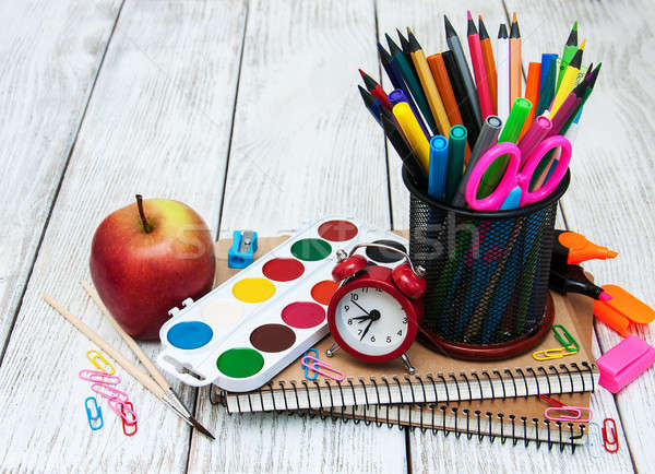 Iskola irodaszerek fa asztal könyv óra alma Stock fotó © almaje