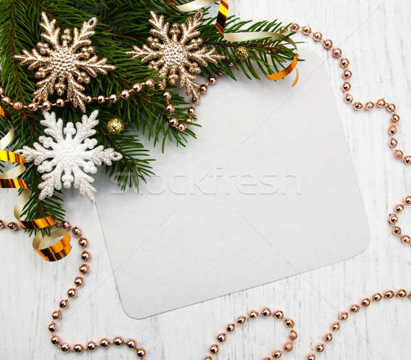 üdvözlőlap karácsony dekoratív hópelyhek fa háttér Stock fotó © almaje