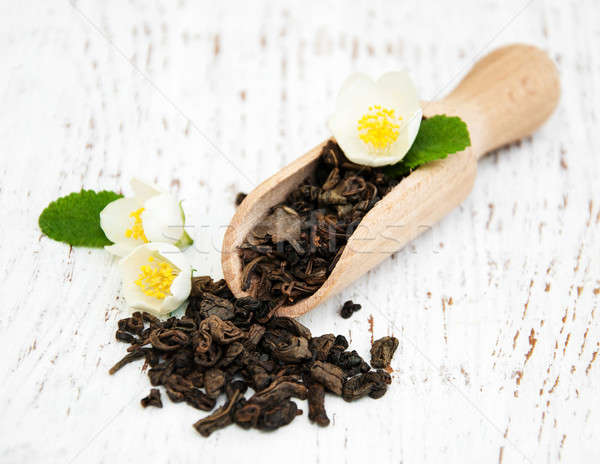 Dry green tea with jasmine flowers Stock photo © almaje