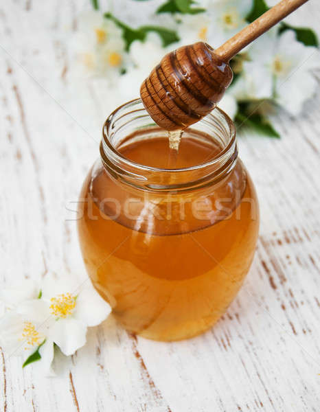 Honey and jasmine  flowers Stock photo © almaje