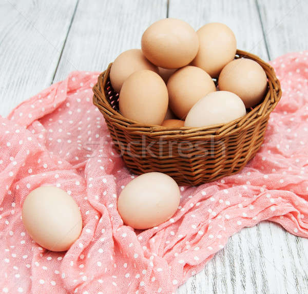 chicken eggs in basket Stock photo © almaje