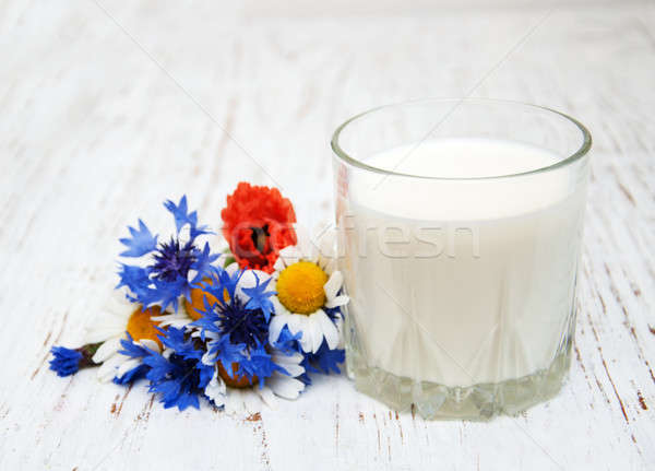 Latte fiori di campo vecchio legno alimentare natura Foto d'archivio © almaje