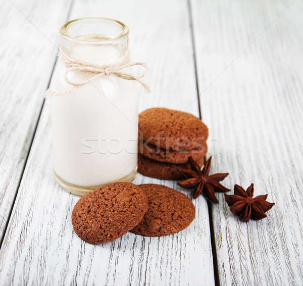 oatmeal cookies and bottle of milk Stock photo © almaje