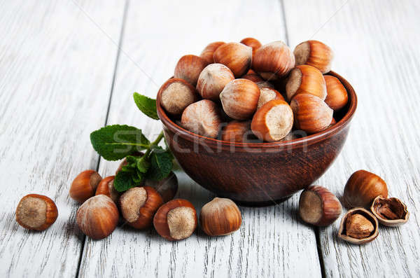 Bowl with hazelnuts Stock photo © almaje