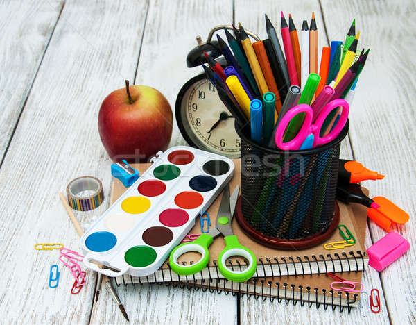 Schule Bürobedarf Holztisch Buch Uhr Apfel Stock foto © almaje