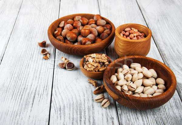 Bowls with different nuts Stock photo © almaje