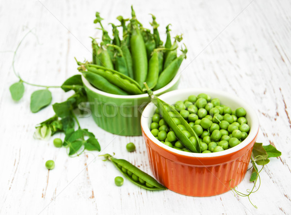 Bowls with fresh peas Stock photo © almaje