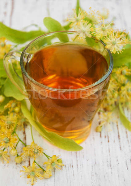 Stock photo: Cup of herbal tea with linden flowers