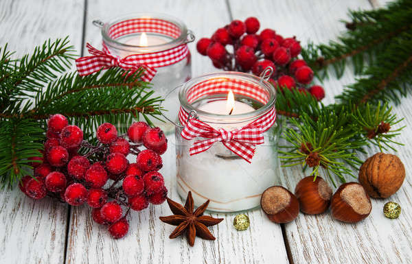 christmas decorations candles in glass jars with fir Stock photo © almaje