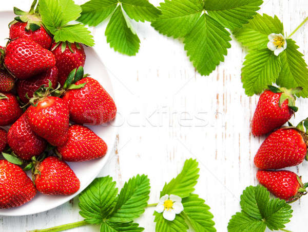 Strawberries with leaves Stock photo © almaje