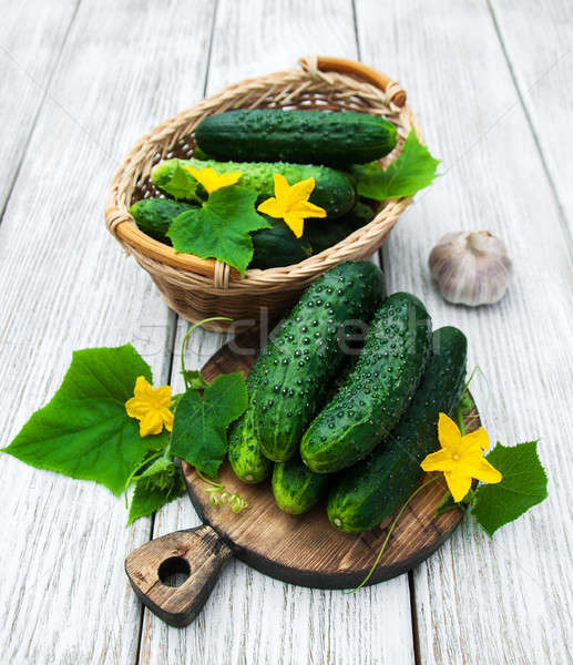 Stock photo: Fresh cucumbers on a table