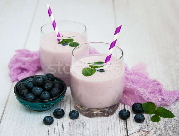 Okulary jogurt tabeli świeże jagody Zdjęcia stock © almaje