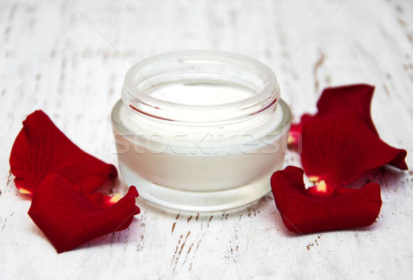 moisturizing cream and rose petals Stock photo © almaje
