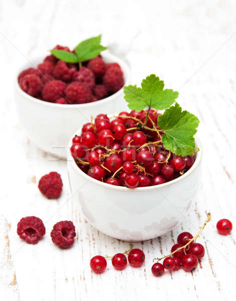 fresh red currant and raspberries Stock photo © almaje