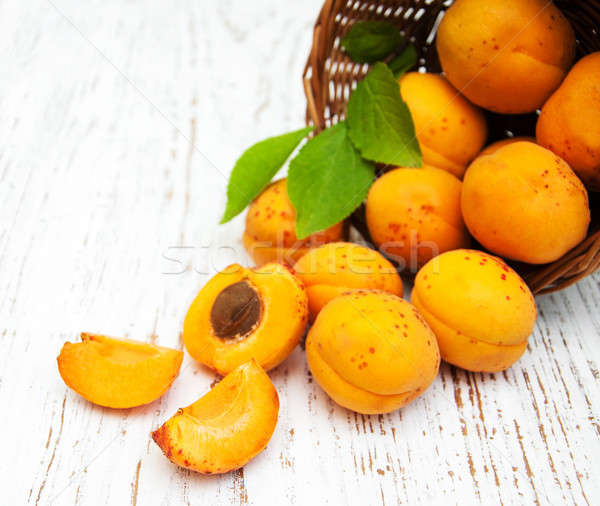 Basket with apricots Stock photo © almaje