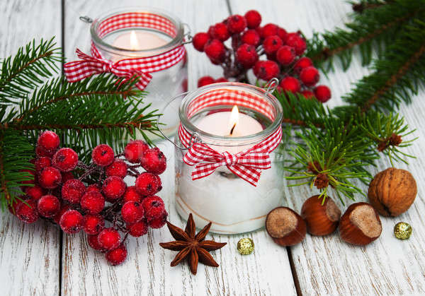 christmas decorations candles in glass jars with fir Stock photo © almaje