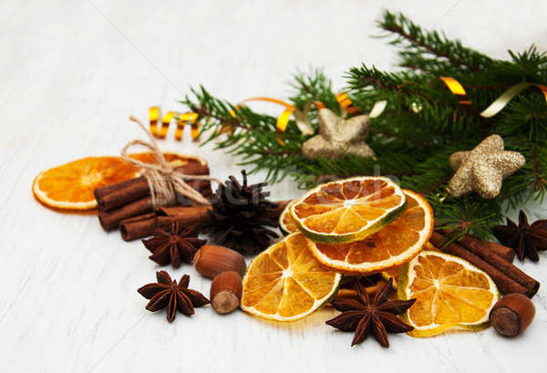 different kinds of spices,  nuts and dried oranges Stock photo © almaje