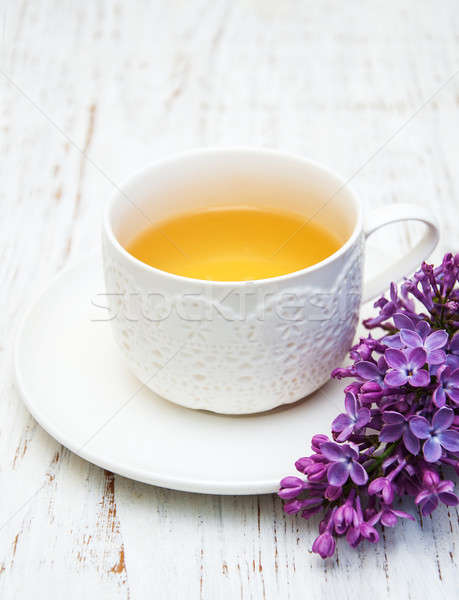 Foto stock: Taza · té · lila · flores · edad