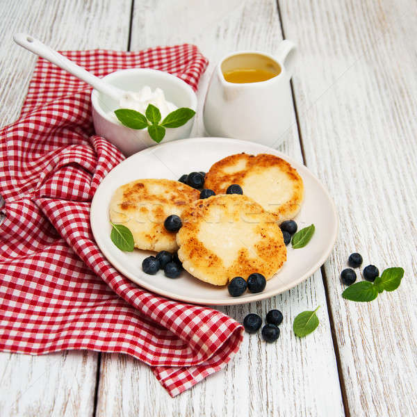 Ricotta pancake mirtillo tavolo in legno alimentare cucina Foto d'archivio © almaje
