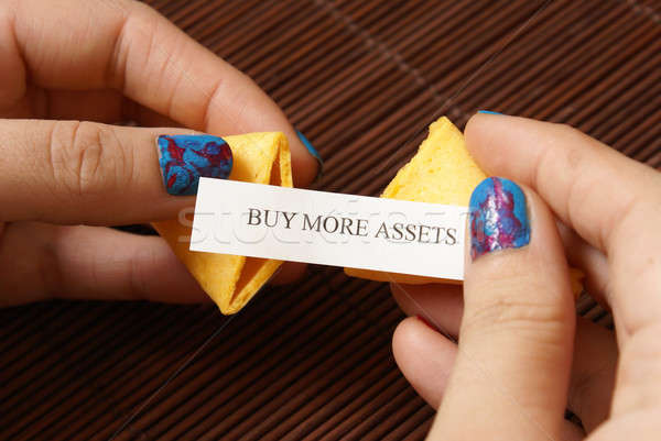 Opening A Fortune Cookie Stock photo © AlphaBaby