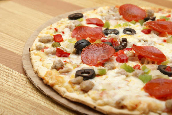 Vékony deluxe pizza friss ül pult Stock fotó © AlphaBaby