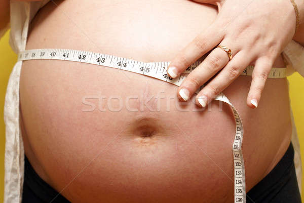 Anyák csípővonal mérés anya babák has Stock fotó © AlphaBaby