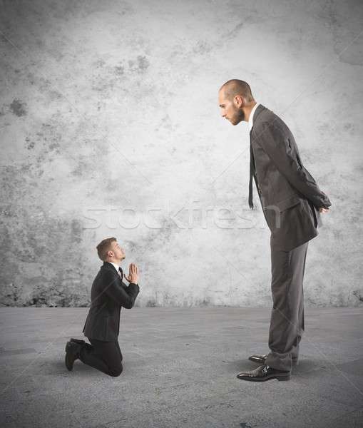 Businessman praying Stock photo © alphaspirit