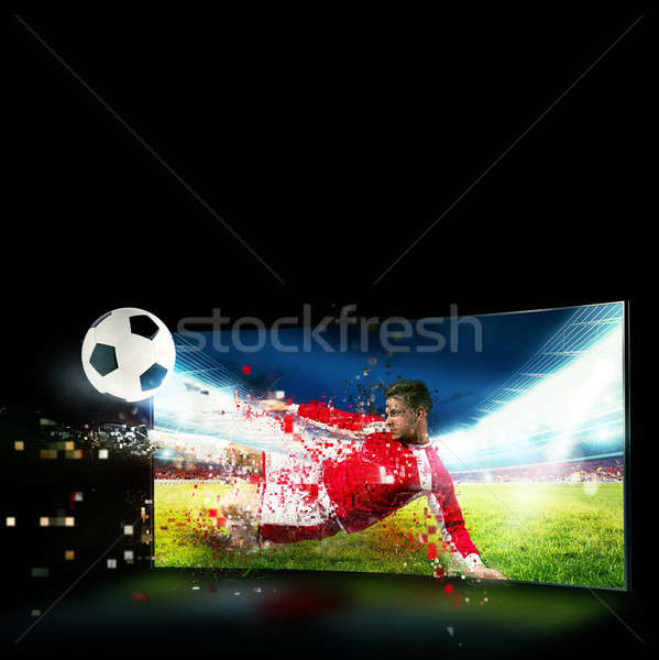 Diffuser tv footballeur sur coup Photo stock © alphaspirit