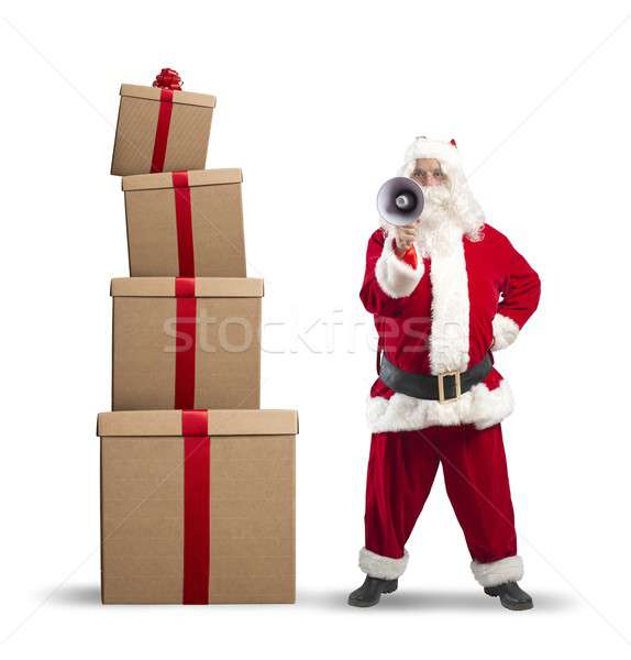 Santa Claus with gift Stock photo © alphaspirit