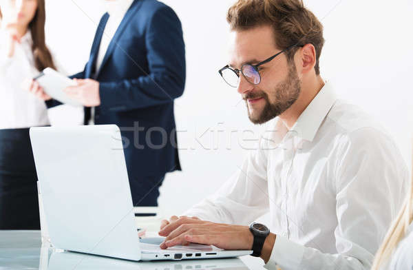 Stock photo: Businessman in office connected on internet network. concept of startup company