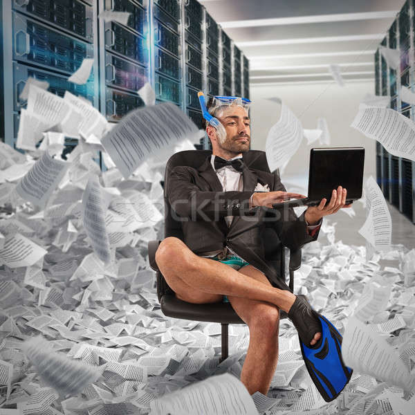 Stock photo: Digitization concept from paper to digital. Businessman uploads documents to a database