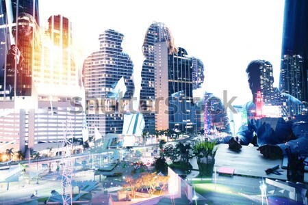 Group of business partner looking for the future. Concept of corporate and startup. double exposure Stock photo © alphaspirit
