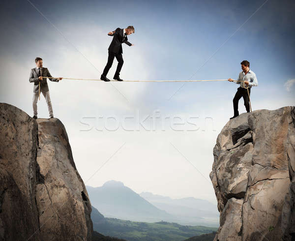 Work together to help a team member Stock photo © alphaspirit