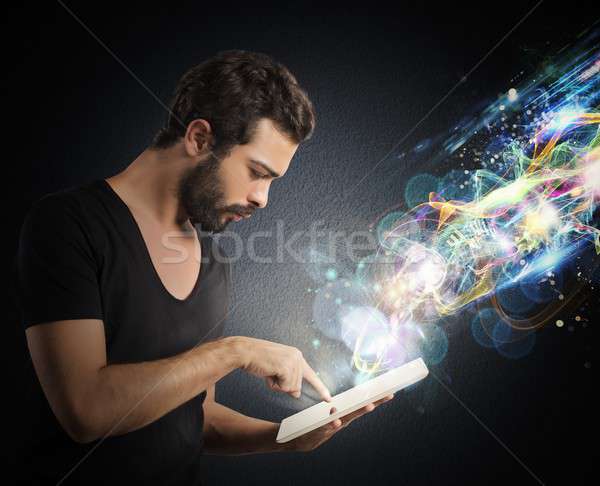 Surf the internet with tablet Stock photo © alphaspirit