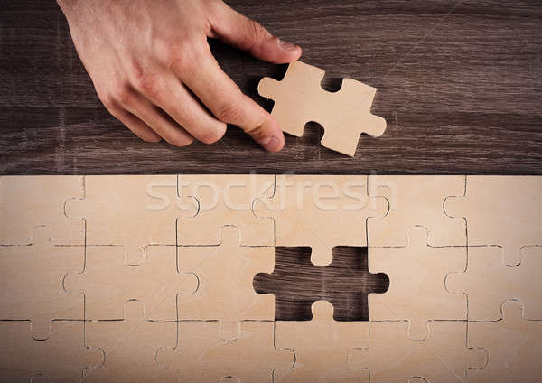 Complete a puzzle Stock photo © alphaspirit