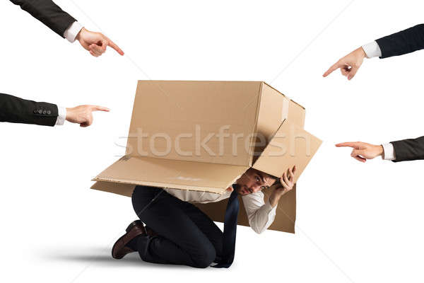 Bűnös üzletember kollégák rejtőzködik karton férfi Stock fotó © alphaspirit