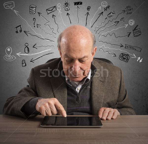 Elderly and technology Stock photo © alphaspirit