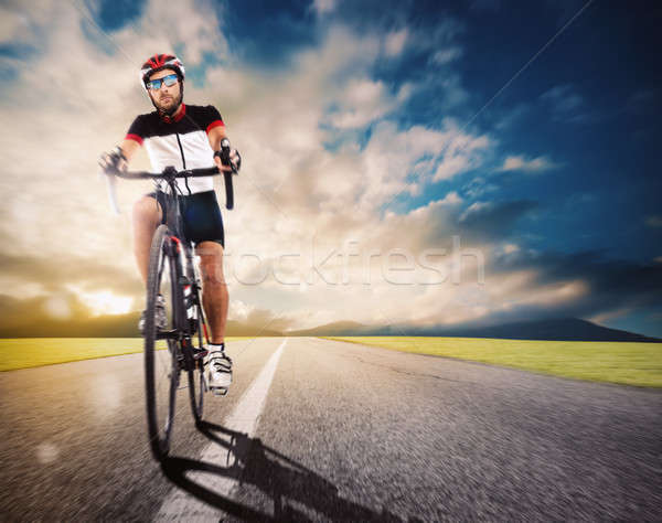 Stock photo: Cyclist on road