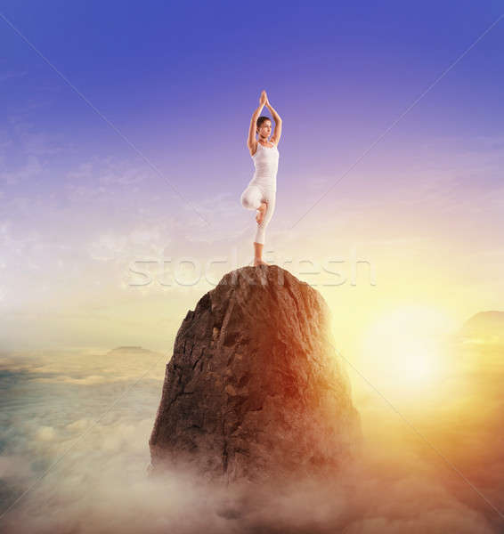 Yoga on top of the mountain Stock photo © alphaspirit
