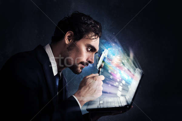 Examine a computer Stock photo © alphaspirit