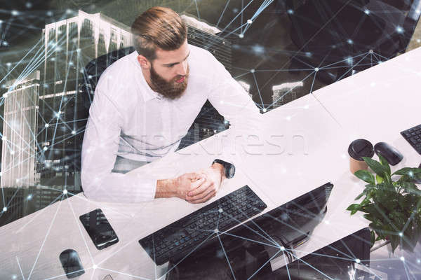 Businessman in office connected on internet network. concept of startup company. double exposure Stock photo © alphaspirit