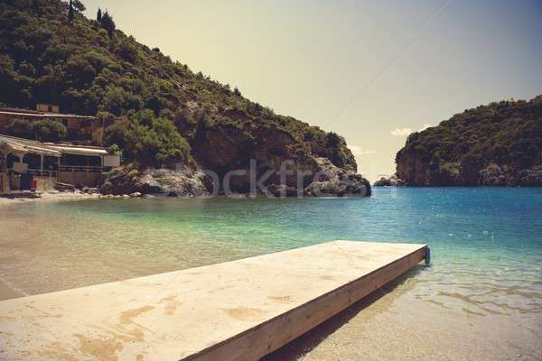 Plage tropicale transparent mer bois pont plage [[stock_photo]] © alphaspirit