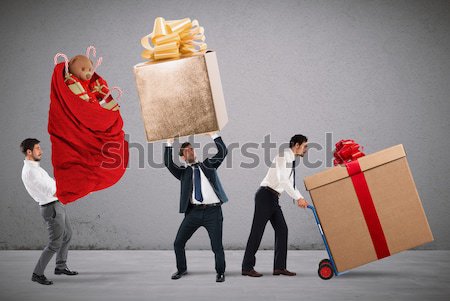 Santa Claus with present for a child Stock photo © alphaspirit