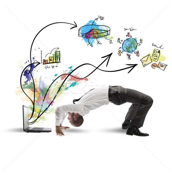 Acrobatic businessman Stock photo © alphaspirit