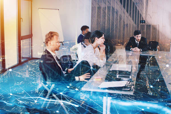 Businessperson in office with network effect. concept of partnership and teamwork Stock photo © alphaspirit