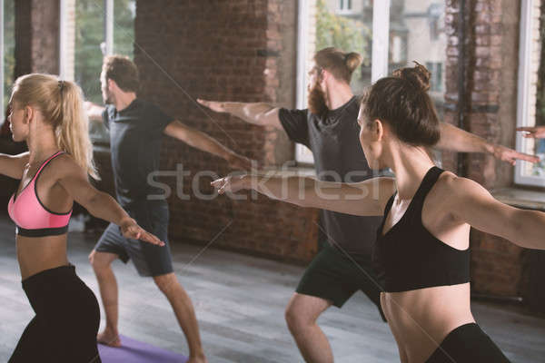 People do stretching at the gym Stock photo © alphaspirit