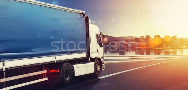 Truck run fast on the highway to deliver Stock photo © alphaspirit