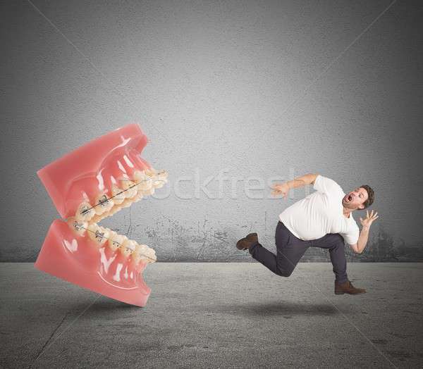 Stock photo: Fear of the dentist